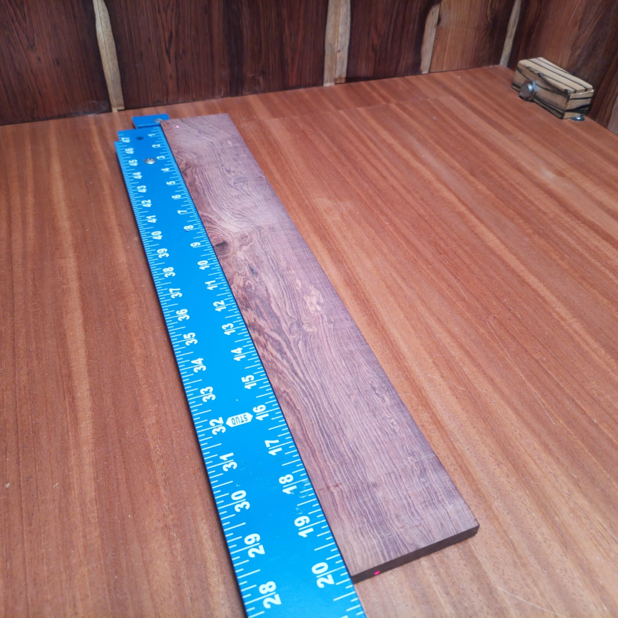Honduran Rosewood Acoustic Rift Sawn Fingerboard Blank 0.4" X 2.9" X 20.2" - HRAFBR000636 2 Crafted from beautiful Honduran Rosewood, this fingerboards blank is perfect for luthiers seeking quality. Its captivating grain and rich tonal qualities make it an ideal choice for crafting exquisite guitars. This durable and stable wood enhances playability, ensuring both strong projection and unique character for your creations. Elevate your instruments with this remarkable fingerboard blank that combines both aesthetics and performance! It is a Honduran Rosewood Acoustic Rift Sawn fingerboard blank with dimensions of 20.2 x 2.9 x 0.4 inches.