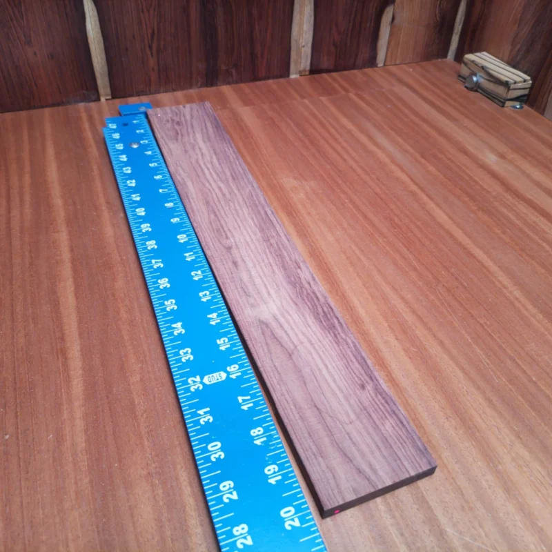 Unlock your creativity with this premium Honduran Rosewood fingerboards blank, perfect for crafting exquisite acoustic instruments. Its rich grain and warm tones enhance sound quality while adding a beautiful finish to any guitar. Ideal dimensions make it suitable for both beginner and professional luthiers looking to elevate their builds. Embrace the art of woodworking with this versatile blank, where every strum resonates with natural beauty. It is a Honduran Rosewood Acoustic Rift Sawn fingerboard blank with dimensions of 20.1 x 3.0 x 0.4 inches.