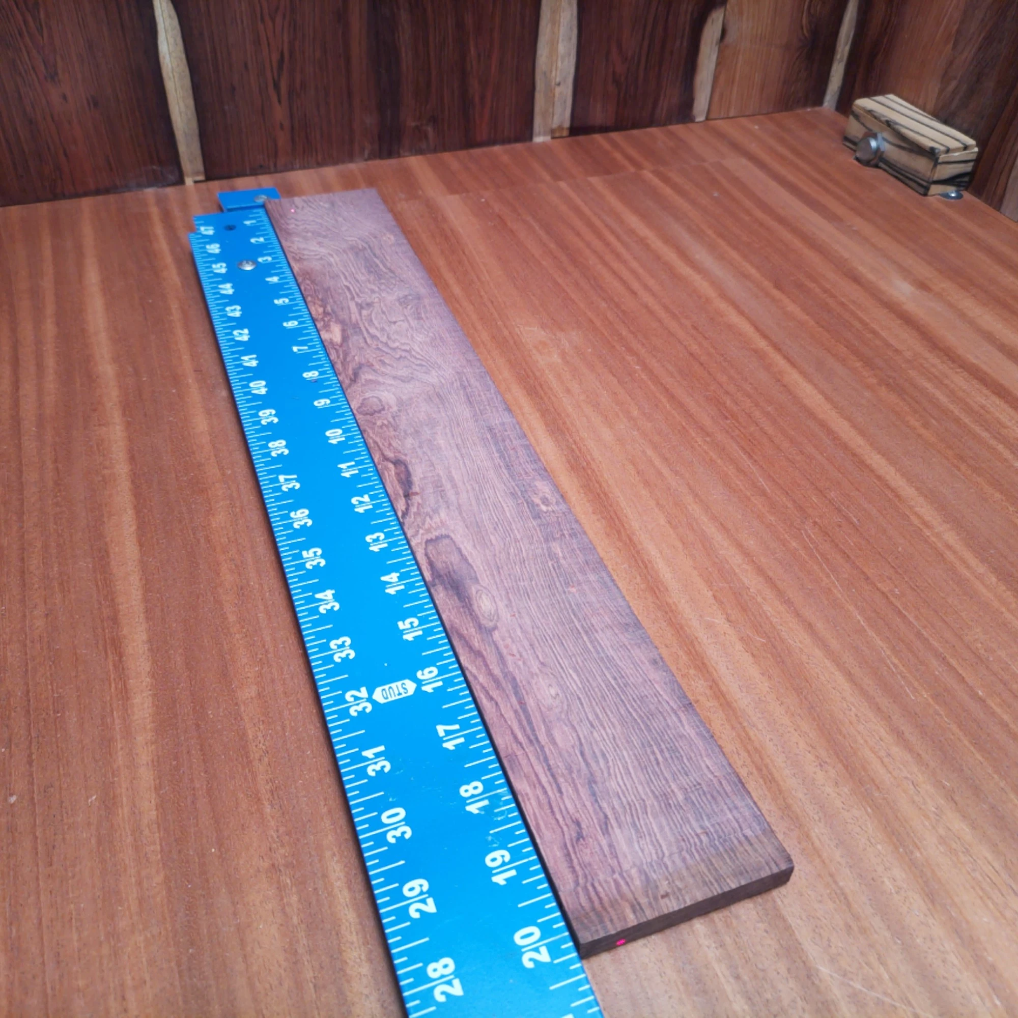 Honduran Rosewood Acoustic Rift Sawn Fingerboard Blank 0.4" X 2.9" X 20.2" - HRAFBR000643 1 Unlock the tonal beauty of your next build with our Honduran Rosewood. This rift sawn blank offers incredible resonance and rich, warm tones. Perfect for acoustic guitar luthiers seeking quality materials, it’s a reliable choice that promises both durability and stunning aesthetics. Elevate your craft with this exceptional wood, guaranteed to help you create beautiful sounds and unforgettable melodies. It is a Honduran Rosewood Acoustic Rift Sawn fingerboard blank with dimensions of 20.2 x 2.9 x 0.4 inches.
