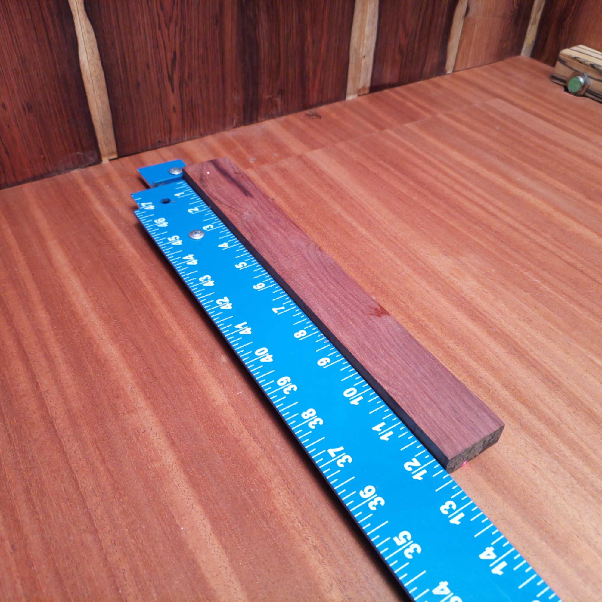 Honduran Rosewood 0.5" X 1.6" X 12.1" Wood Blank for Woodworking Projects - HRDL001125 3 With Honduran Rosewood in hand, you’re ready to create luxury pieces like a guitar fingerboard or a stylish picture frame. Imagine turning that wood into a premium door stop, or even elegant jewelry dishes that will leave your guests awe-struck. Who knew wood could sing such a high-end tune? From unique chess pieces to bespoke bookmarks, this wood makes every project sing with style! This piece of Honduran Rosewood measures 0.5 inches by 1.6 inches by 12.1 inches, offering a high-quality option for a variety of woodworking projects.