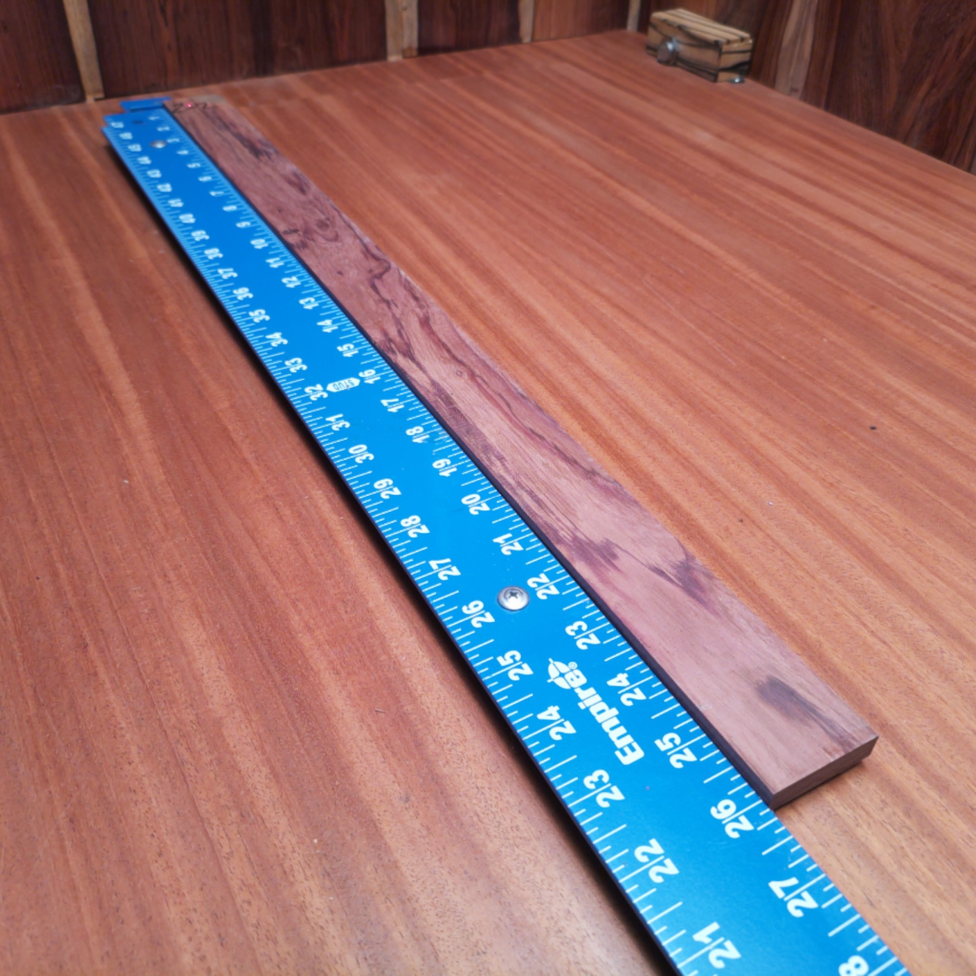 Honduran Rosewood 0.3" X 1.6" X 26.0" Wood Blank for Woodworking Projects - HRDL001129 1 With a piece of breathtaking Honduran Rosewood, go wild creating stunning guitar fretboards and elegant picture frames! Channel your inner artisan to craft luxurious knife handles or luxurious coasters, keeping spirits high while sipping beverages. Plus, let’s not forget about the stylish drawer pulls that'll make your furniture the talk of the town! This piece of Honduran Rosewood measures 0.3 inches by 1.6 inches by 26.0 inches, offering a high-quality option for a variety of woodworking projects.