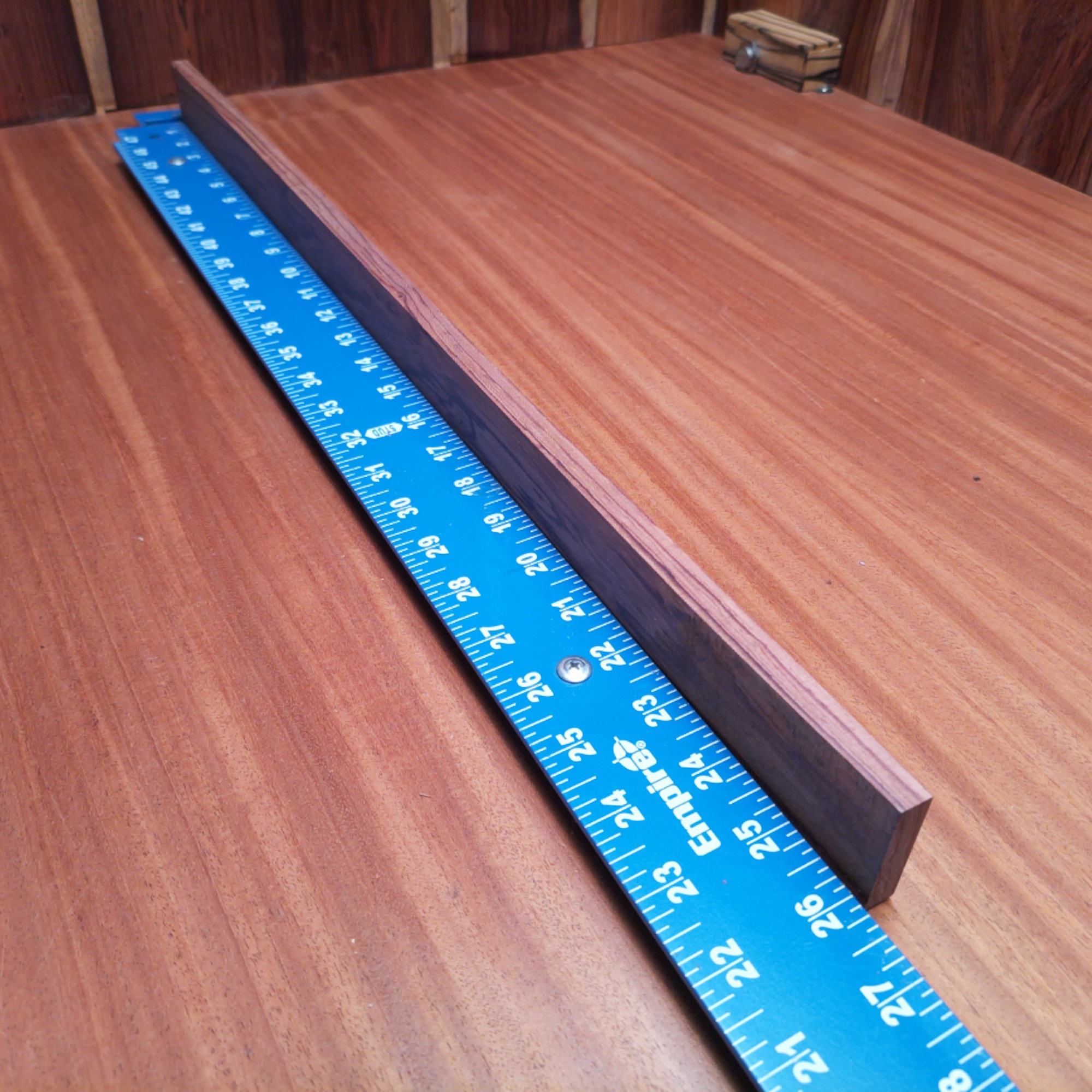 Honduran Rosewood 0.3" X 1.6" X 26.0" Wood Blank for Woodworking Projects - HRDL001129 2 With a piece of breathtaking Honduran Rosewood, go wild creating stunning guitar fretboards and elegant picture frames! Channel your inner artisan to craft luxurious knife handles or luxurious coasters, keeping spirits high while sipping beverages. Plus, let’s not forget about the stylish drawer pulls that'll make your furniture the talk of the town! This piece of Honduran Rosewood measures 0.3 inches by 1.6 inches by 26.0 inches, offering a high-quality option for a variety of woodworking projects.