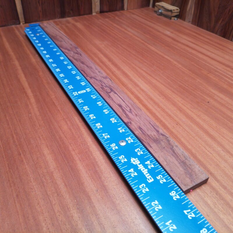 Honduran Rosewood 0.3" X 1.6" X 26.0" Wood Blank for Woodworking Projects - HRDL001129 6 With a piece of breathtaking Honduran Rosewood, go wild creating stunning guitar fretboards and elegant picture frames! Channel your inner artisan to craft luxurious knife handles or luxurious coasters, keeping spirits high while sipping beverages. Plus, let’s not forget about the stylish drawer pulls that'll make your furniture the talk of the town! This piece of Honduran Rosewood measures 0.3 inches by 1.6 inches by 26.0 inches, offering a high-quality option for a variety of woodworking projects.