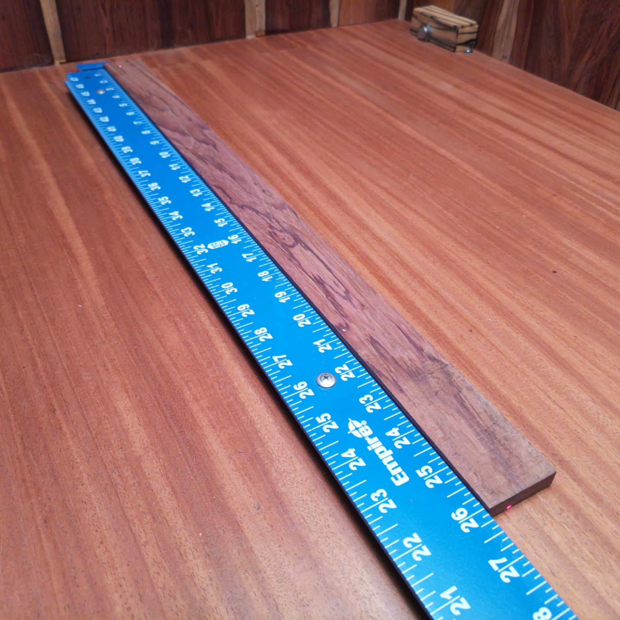 Honduran Rosewood 0.3" X 1.6" X 26.0" Wood Blank for Woodworking Projects - HRDL001129 3 With a piece of breathtaking Honduran Rosewood, go wild creating stunning guitar fretboards and elegant picture frames! Channel your inner artisan to craft luxurious knife handles or luxurious coasters, keeping spirits high while sipping beverages. Plus, let’s not forget about the stylish drawer pulls that'll make your furniture the talk of the town! This piece of Honduran Rosewood measures 0.3 inches by 1.6 inches by 26.0 inches, offering a high-quality option for a variety of woodworking projects.