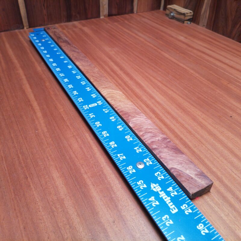 Dimensional Lumber 126 With this luxurious piece of Honduran Rosewood, your dreams can come to life! Imagine a guitar neck strumming sweet melodies, or custom knife handles that feel like extensions of your hand. Not to mention, a unique bookend that keeps your literary treasures organized while adding flair. Who knew that a decorative table centerpiece could steal the show, all while holding your utensils? Let's just say, this wood does it all! This piece of Honduran Rosewood measures 0.5 inches by 1.3 inches by 24.6 inches, offering a high-quality option for a variety of woodworking projects.