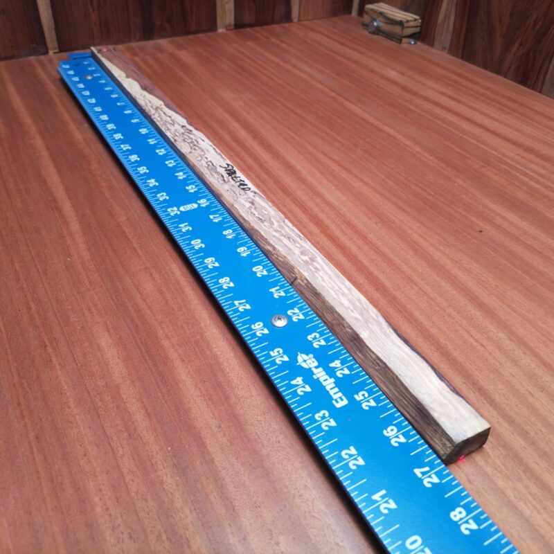 Dimensional Lumber 139 Introducing the Honduran Rosewood G2: a versatile masterpiece! With it, you could carve out a luxury guitar neck, sculpt a stunning art piece, or even create one-of-a-kind chopsticks. Maybe you want it for decorative bookmarks or that fancy minimalist desk organizer? The possibilities are endless, just like my love for wood! This piece of Honduran Rosewood measures 0.7 inches by 1.2 inches by 26.8 inches, offering a high-quality option for a variety of woodworking projects.