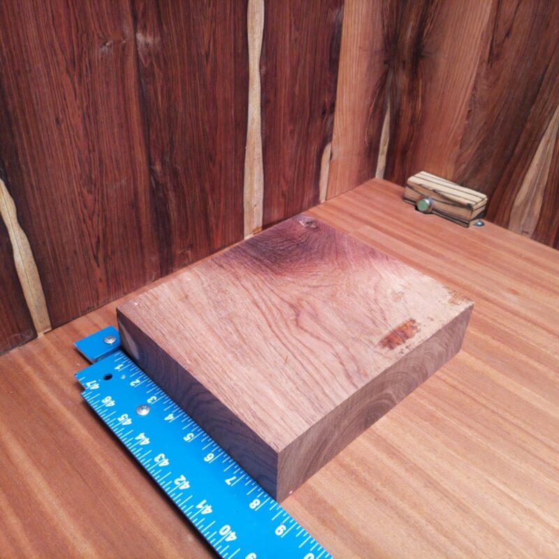 Honduran Rosewood 2.4" X 9.3" X 8.4" Wood Blank for Woodworking Projects - HRDL001150 6 Using Honduran Rosewood, you can create luxurious coasters, a stylish tablet stand, or a custom knife handle that impresses your cooking friends! This rich wood adds sophistication to a decorative bowl or serves as an elegant picture frame, perfect for showcasing your finest memories. Who knew so much elegance could come from one piece of wood? This piece of Honduran Rosewood measures 2.4 inches by 9.3 inches by 8.4 inches, offering a high-quality option for a variety of woodworking projects.
