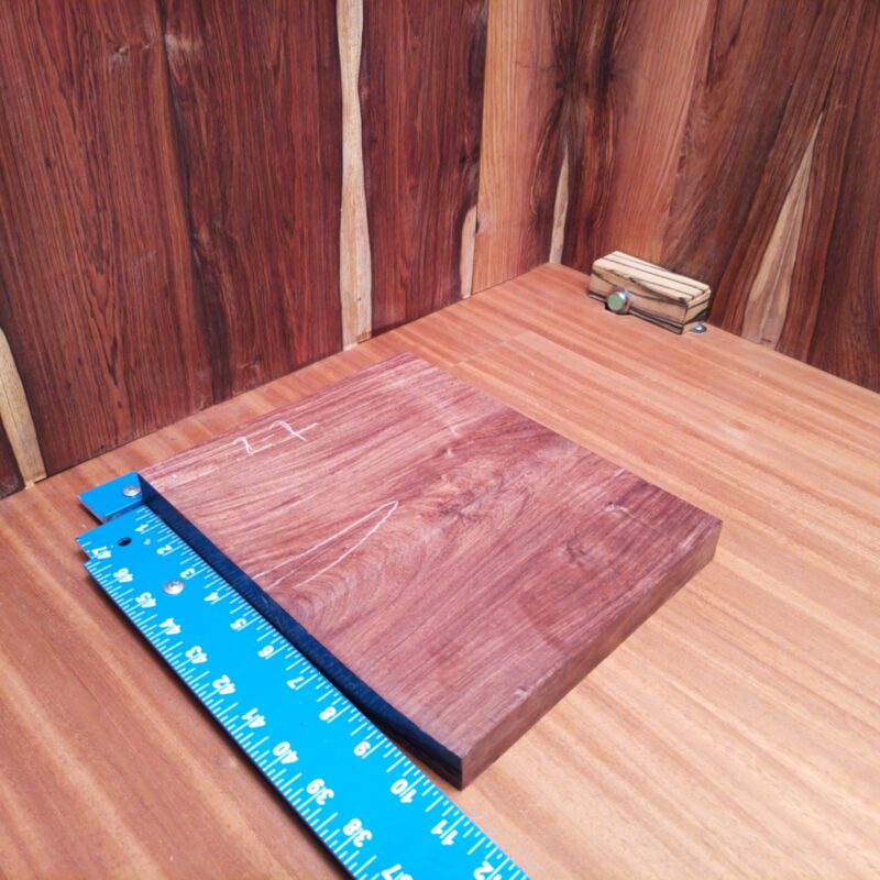 Dimensional Lumber 160 Imagine a luxury jewelry box that opens to reveal your finest gems, or a custom guitar body that sings in perfect harmony! With the stunning potential of Honduran Rosewood, you’ve got everything from high-end drawer pulls to elegant picture frames and unique serving trays. It’s time to let your creativity flow like a fine wine in a bespoke wine rack! This piece of Honduran Rosewood measures 1.1 inches by 8.6 inches by 10.5 inches, offering a high-quality option for a variety of woodworking projects.