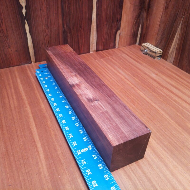 With a stunning piece of Honduran Rosewood, you could create custom guitar necks and stunning wall sculptures! Picture your coffee table boasting luxury legs, as elegant napkin rings catch every discerning eye. Whether it's a unique drawer pull or handcrafted serving tray, this wood isn't just a pretty face—it brings handmade charm to practical applications. Who knew functionality could have such high-end flair? This piece of Honduran Rosewood measures 3.2 inches by 3.2 inches by 18.5 inches, offering a high-quality option for a variety of woodworking projects.