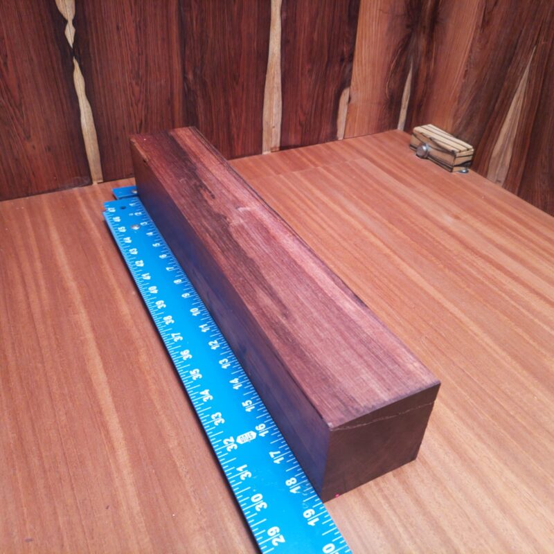 With a stunning piece of Honduran Rosewood, you could create custom guitar necks and stunning wall sculptures! Picture your coffee table boasting luxury legs, as elegant napkin rings catch every discerning eye. Whether it's a unique drawer pull or handcrafted serving tray, this wood isn't just a pretty face—it brings handmade charm to practical applications. Who knew functionality could have such high-end flair? This piece of Honduran Rosewood measures 3.2 inches by 3.2 inches by 18.5 inches, offering a high-quality option for a variety of woodworking projects.
