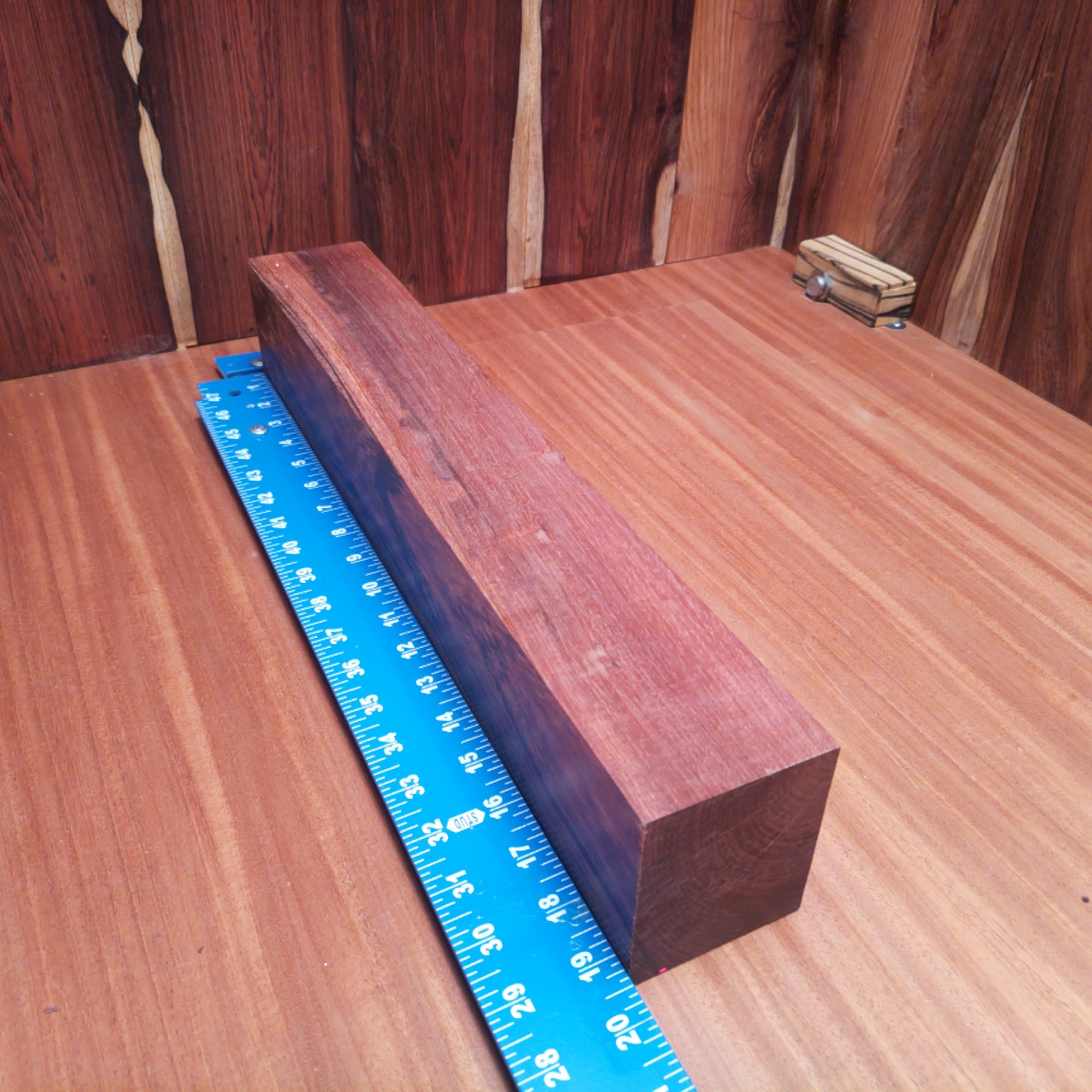Honduran Rosewood 2.9" X 3.2" X 19.3" Wood Blank for Woodworking Projects - HRDL001160 2 Unleash your creativity with Honduran Rosewood! Imagine stylish drawer pulls, luxurious coasters, or an avant-garde sculpture that steals the show! Whether it’s a modern lamp base or a unique chess set, this wood reinvents functionality with flair. Your home decor will feel like a gallery, and you might start inviting friends over just to showcase your wooden wonders! This piece of Honduran Rosewood measures 2.9 inches by 3.2 inches by 19.3 inches, offering a high-quality option for a variety of woodworking projects.