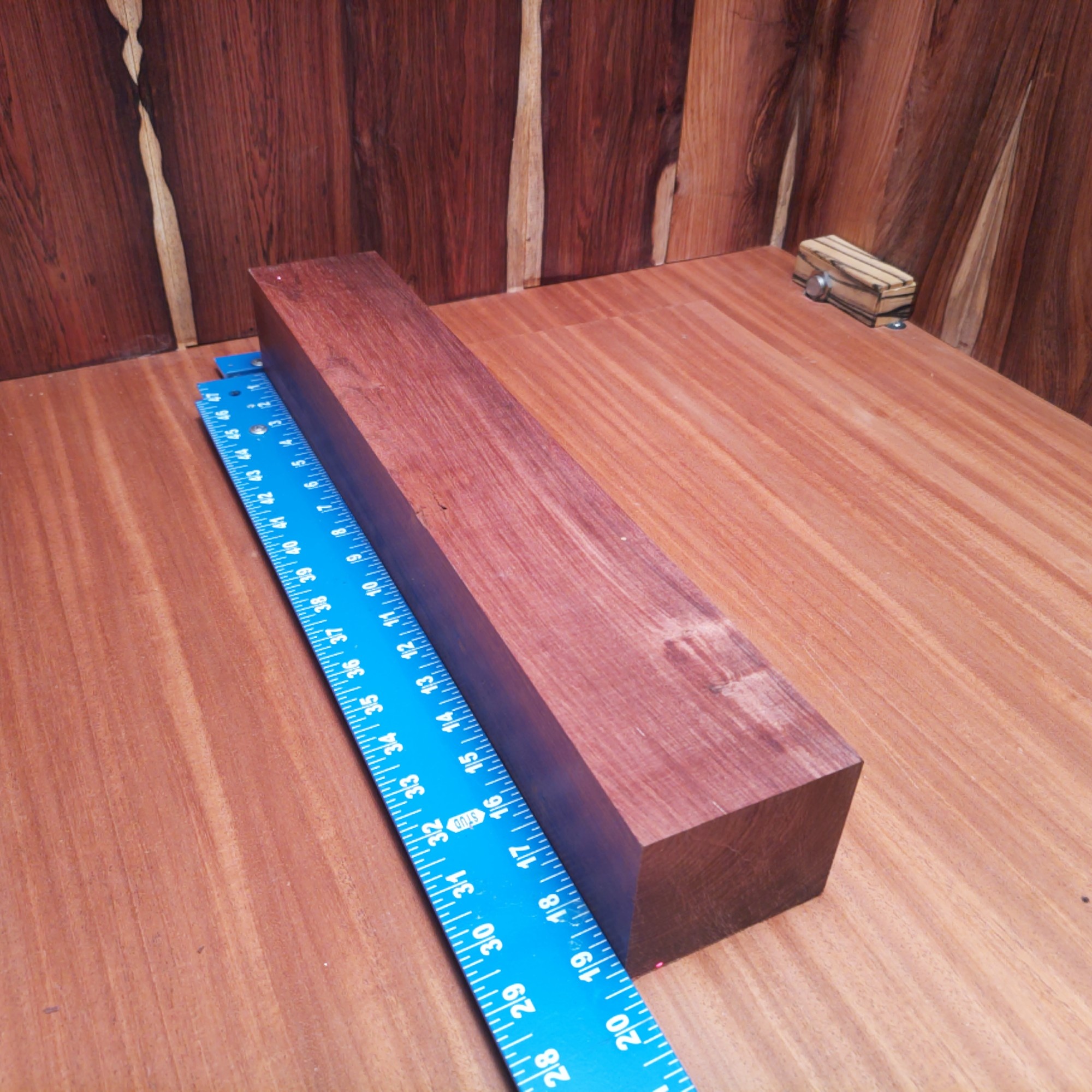 Honduran Rosewood 2.9" X 3.2" X 19.3" Wood Blank for Woodworking Projects - HRDL001160 3 Unleash your creativity with Honduran Rosewood! Imagine stylish drawer pulls, luxurious coasters, or an avant-garde sculpture that steals the show! Whether it’s a modern lamp base or a unique chess set, this wood reinvents functionality with flair. Your home decor will feel like a gallery, and you might start inviting friends over just to showcase your wooden wonders! This piece of Honduran Rosewood measures 2.9 inches by 3.2 inches by 19.3 inches, offering a high-quality option for a variety of woodworking projects.