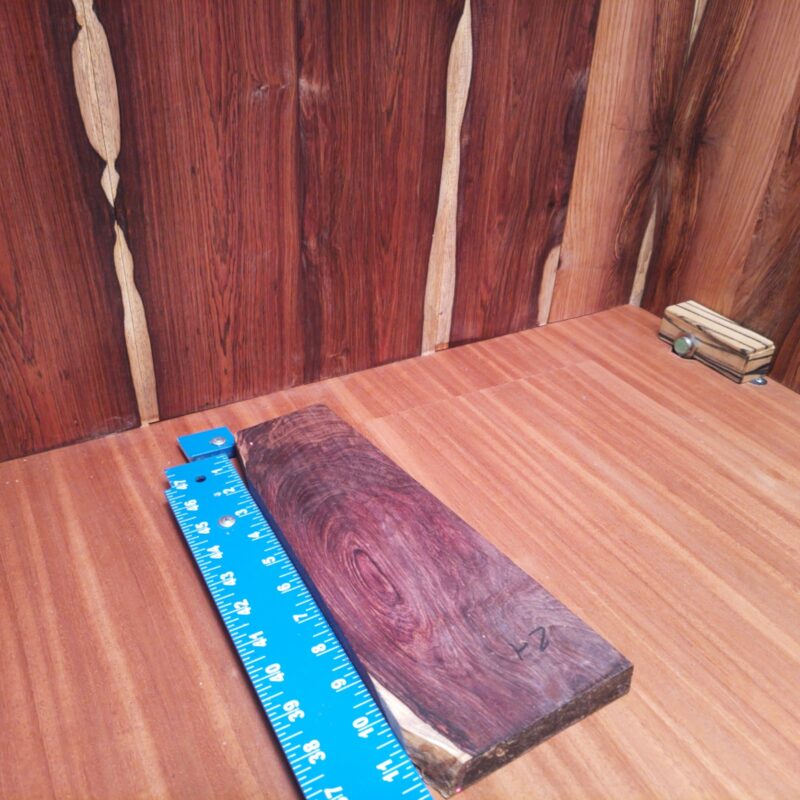 With Honduran Rosewood, you can transform the mundane into masterpieces! Envision crafting a luxurious knife handle, a stylish smartphone stand, or even an elegant candle holder. Each piece exhibits beauty worthy of any high-class establishment. Whether it's a photogenic wall hook or a designer charging dock, let your creativity flourish! This piece of Honduran Rosewood measures 0.7 inches by 3.4 inches by 11.8 inches, offering a high-quality option for a variety of woodworking projects.