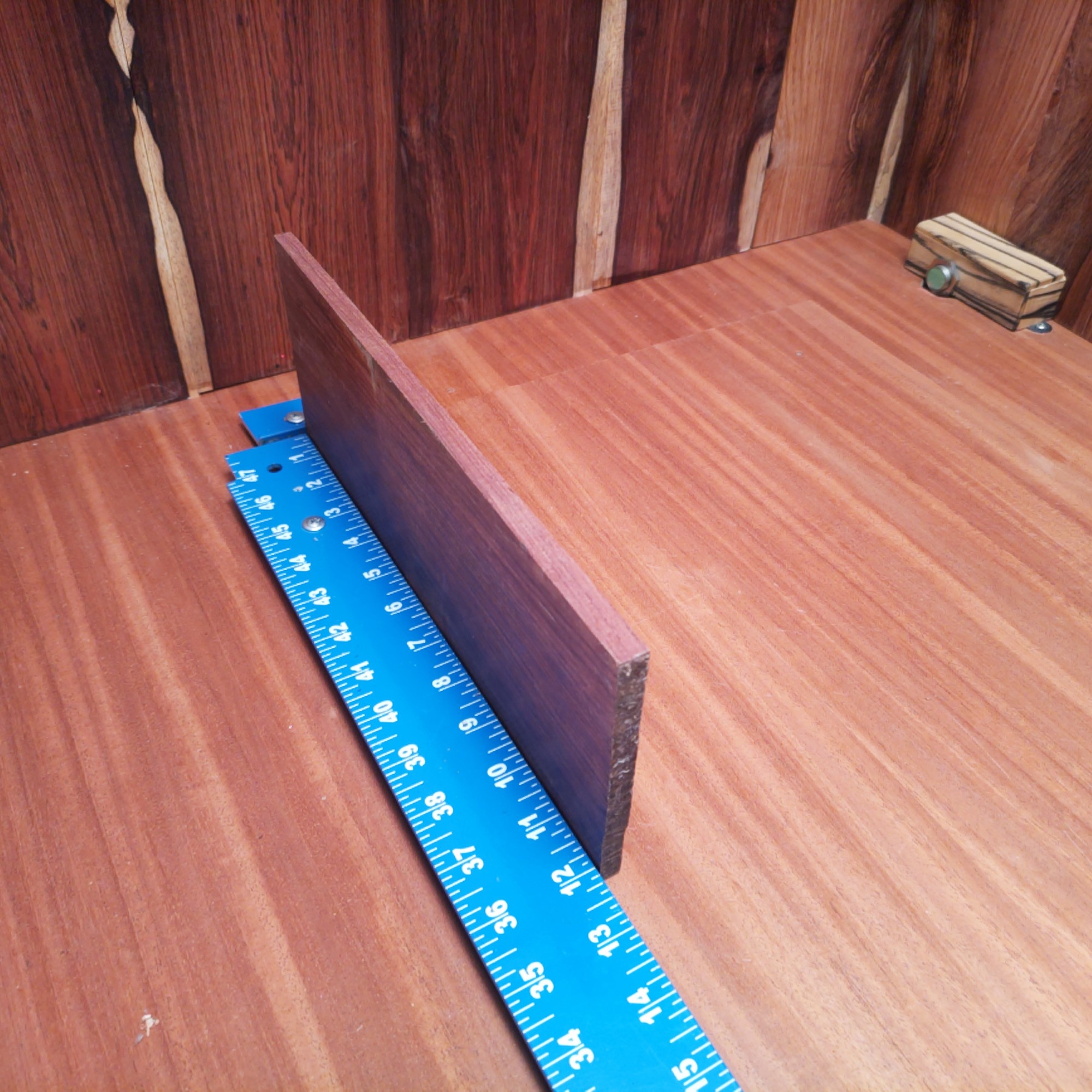 Honduran Rosewood 0.2" X 4.6" X 11.9" Wood Blank for Woodworking Projects - HRDL001165 2 With a dash of Honduran Rosewood, you can craft luxurious coasters and high-end guitar neck bindings while flaunting custom knife handles! Get creative with decorative wall art and make those boring keychains something to remember! It’s like popping confetti at a woodworkers' party—everyone loves it! This piece of Honduran Rosewood measures 0.2 inches by 4.6 inches by 11.9 inches, offering a high-quality option for a variety of woodworking projects.