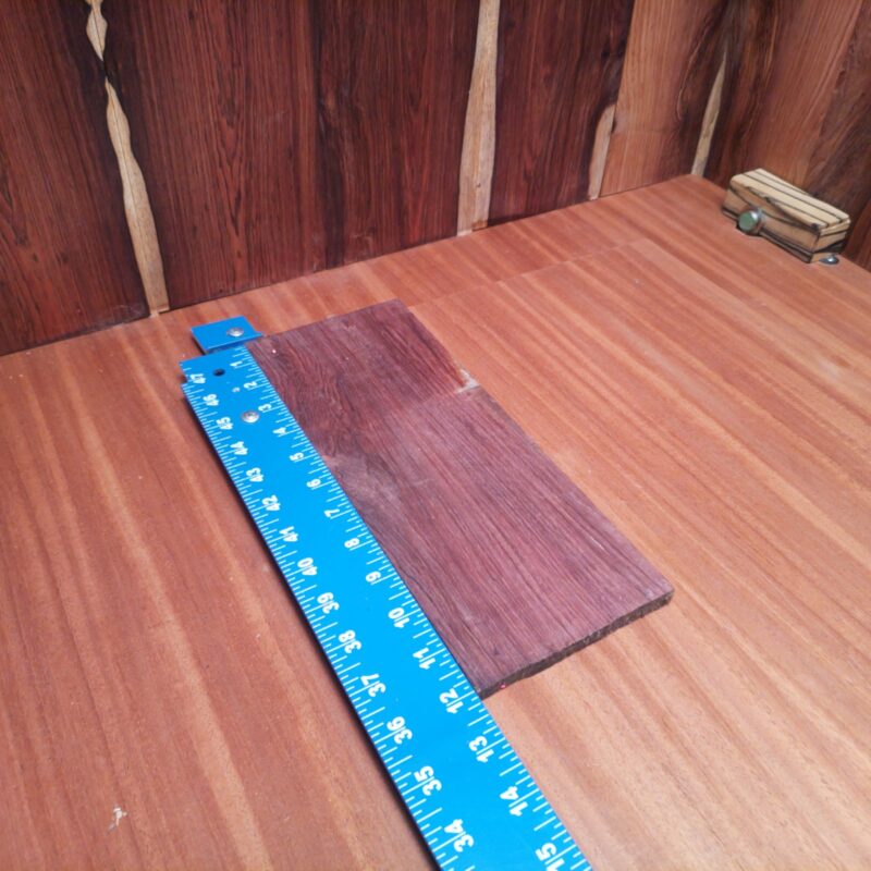 Honduran Rosewood 0.2" X 4.6" X 11.9" Wood Blank for Woodworking Projects - HRDL001165 6 With a dash of Honduran Rosewood, you can craft luxurious coasters and high-end guitar neck bindings while flaunting custom knife handles! Get creative with decorative wall art and make those boring keychains something to remember! It’s like popping confetti at a woodworkers' party—everyone loves it! This piece of Honduran Rosewood measures 0.2 inches by 4.6 inches by 11.9 inches, offering a high-quality option for a variety of woodworking projects.
