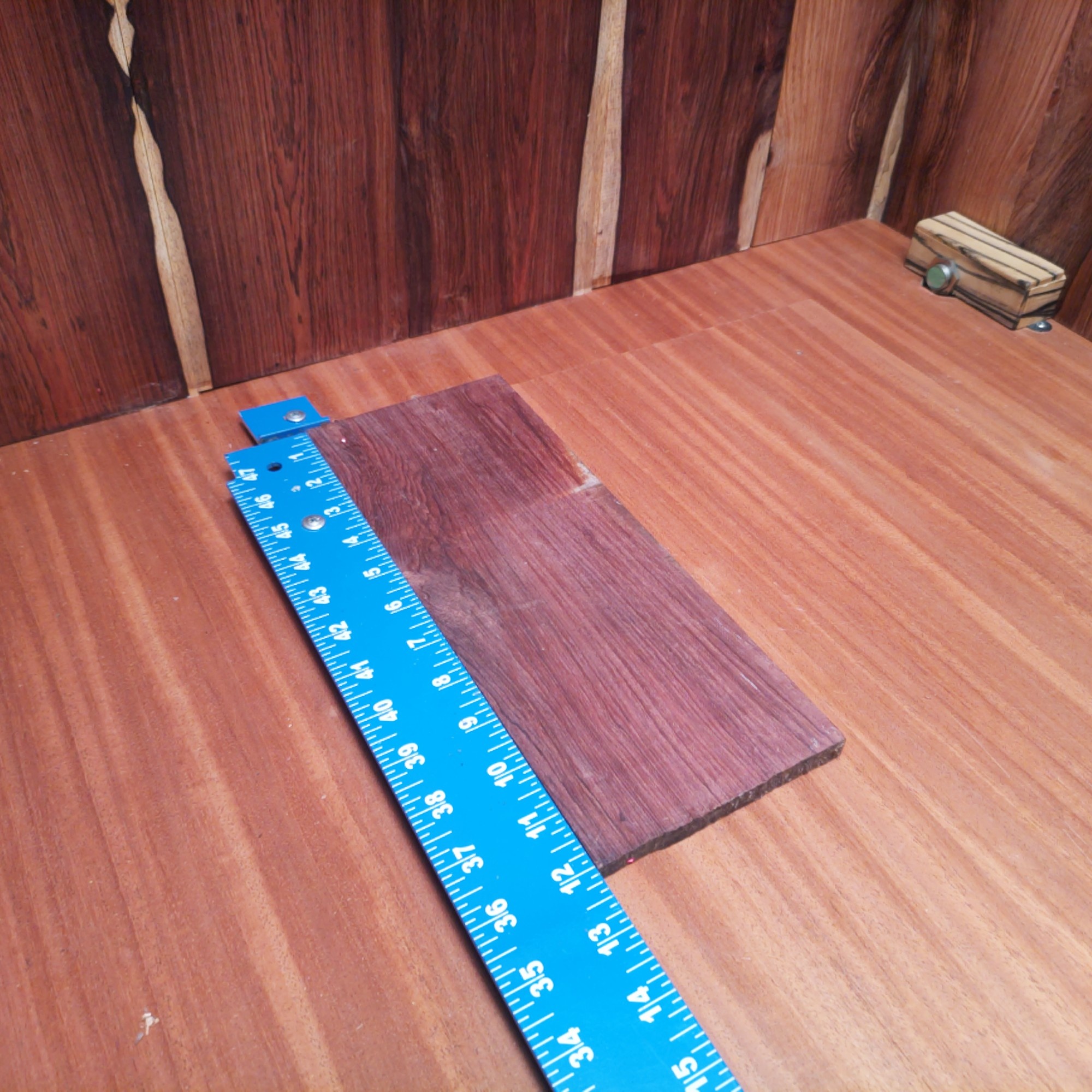 Honduran Rosewood 0.2" X 4.6" X 11.9" Wood Blank for Woodworking Projects - HRDL001165 3 With a dash of Honduran Rosewood, you can craft luxurious coasters and high-end guitar neck bindings while flaunting custom knife handles! Get creative with decorative wall art and make those boring keychains something to remember! It’s like popping confetti at a woodworkers' party—everyone loves it! This piece of Honduran Rosewood measures 0.2 inches by 4.6 inches by 11.9 inches, offering a high-quality option for a variety of woodworking projects.