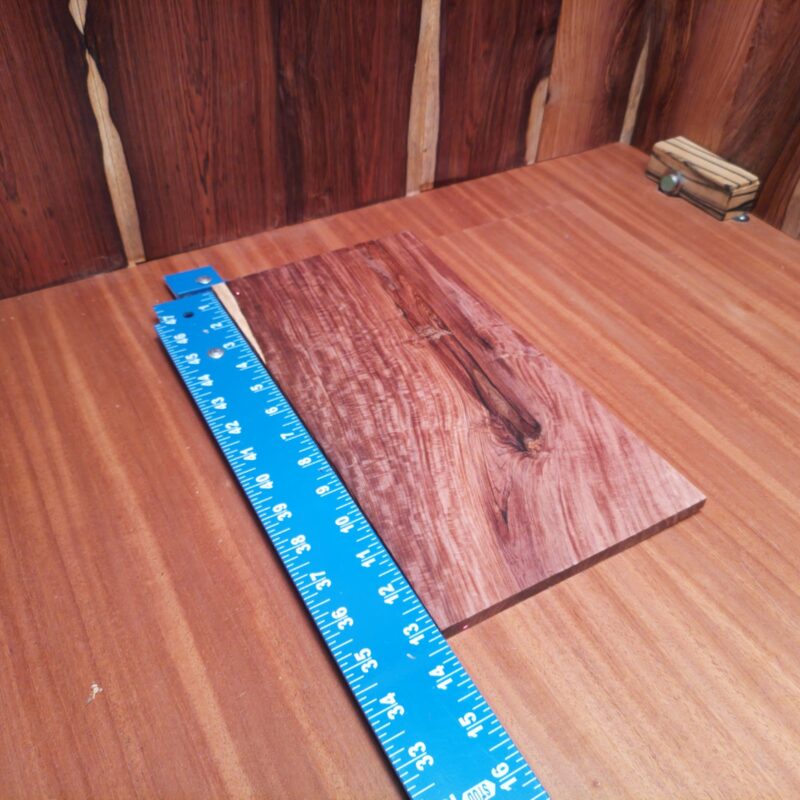 With Honduran Rosewood's charm, you can create a custom guitar pick or an elegant wine stopper. Picture your friends admiring handcrafted picture frames amidst premium coasters. Forget boring gifts—this wood transforms into luxurious bookmarks and stylish coat hooks that might just outperform your puns at parties! This piece of Honduran Rosewood measures 0.3 inches by 7.0 inches by 13.0 inches, offering a high-quality option for a variety of woodworking projects.