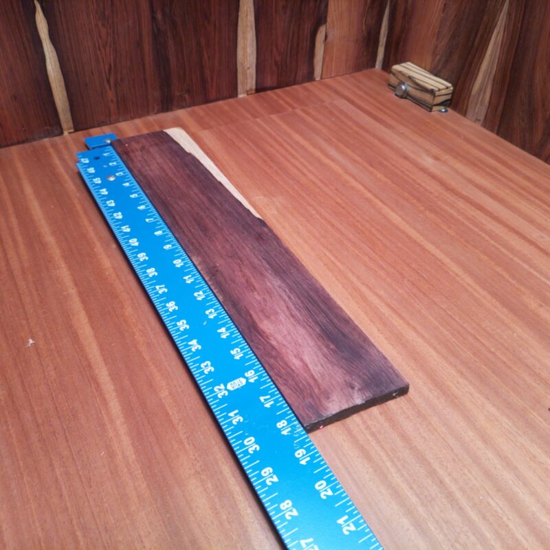 Honduran Rosewood 0.4" X 3.5" X 18.2" Wood Blank for Woodworking Projects - HRDL001172 6 Grab your Honduran Rosewood and craft wonders! Imagine unique drawer pulls, elegant picture frames, and custom guitar picks that make strumming a delight. Each piece is a chance to unleash creativity—whether it's high-end coasters or rustic candle holders, there's no limit to your artisanal ambitions. Let your imagination soar while playing with wood! This piece of Honduran Rosewood measures 0.4 inches by 3.5 inches by 18.2 inches, offering a high-quality option for a variety of woodworking projects.