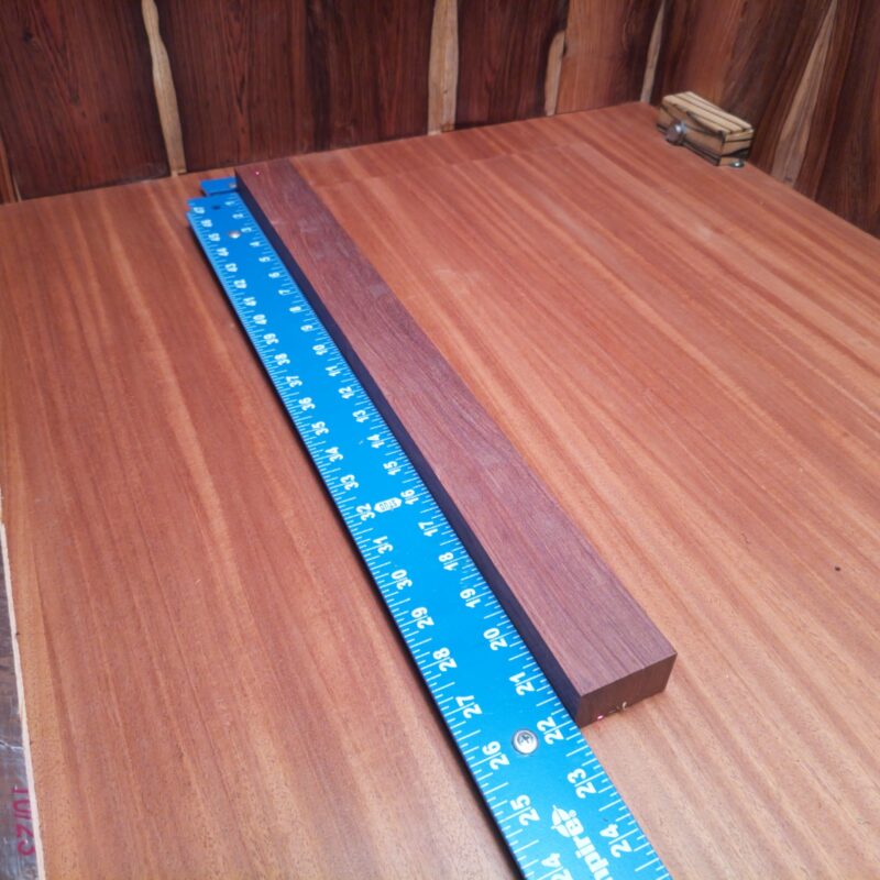 Honduran Rosewood 1.1" X 1.8" X 21.9" Wood Blank for Woodworking Projects - HRDL001181 6 Unleash your creativity with this splendid Honduran Rosewood! Whether you're crafting luxury pens or artistic picture frames, the possibilities are endless! Picture bespoke wooden spoons that make your soup taste fancier, or elegant candle holders that make your room feel like a five-star hotel. Just don't forget to add those unique curtain tiebacks to your collection! Who knew a piece of wood could bring so much joy? This piece of Honduran Rosewood measures 1.1 inches by 1.8 inches by 21.9 inches, offering a high-quality option for a variety of woodworking projects.