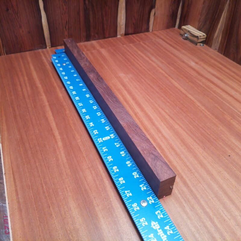 Honduran Rosewood 1.1" X 1.8" X 21.9" Wood Blank for Woodworking Projects - HRDL001181 7 Unleash your creativity with this splendid Honduran Rosewood! Whether you're crafting luxury pens or artistic picture frames, the possibilities are endless! Picture bespoke wooden spoons that make your soup taste fancier, or elegant candle holders that make your room feel like a five-star hotel. Just don't forget to add those unique curtain tiebacks to your collection! Who knew a piece of wood could bring so much joy? This piece of Honduran Rosewood measures 1.1 inches by 1.8 inches by 21.9 inches, offering a high-quality option for a variety of woodworking projects.
