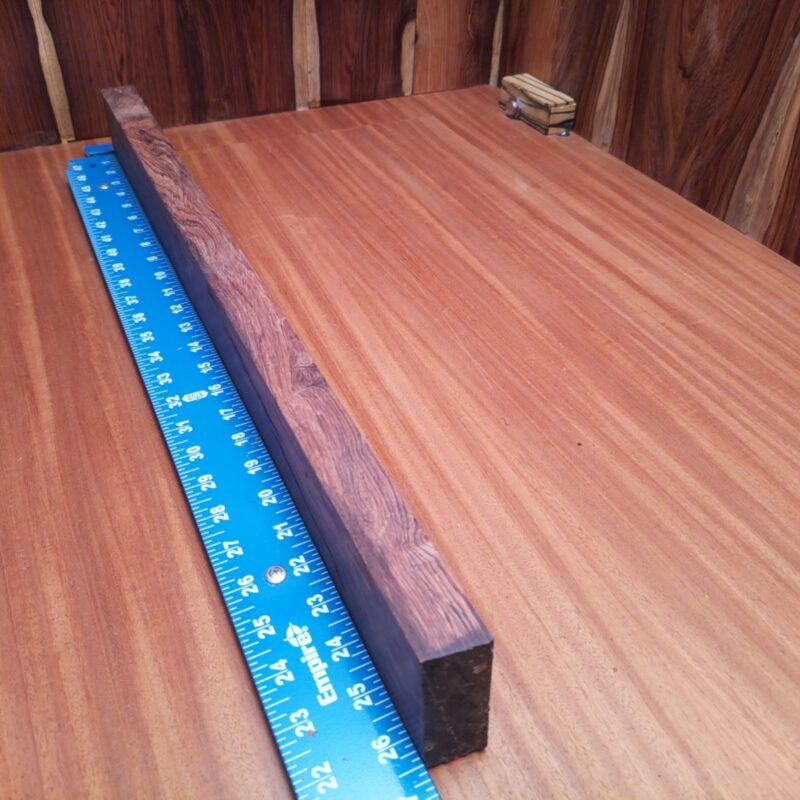 Honduran Rosewood 1.1" X 2.7" X 26.4" Wood Blank for Woodworking Projects - HRDL001185 5 Craft something luxurious with your Honduran Rosewood! From elegant coffee table legs to unique jewelry boxes, this versatile piece allows you to create high-end drawer pulls and charming picture frames with flair. If you ever wanted a knife handle that doubles as a conversation starter, you'll love this wood's charm! Get ready to unleash your inner artisan and turn your home into a gallery! This piece of Honduran Rosewood measures 1.1 inches by 2.7 inches by 26.4 inches, offering a high-quality option for a variety of woodworking projects.