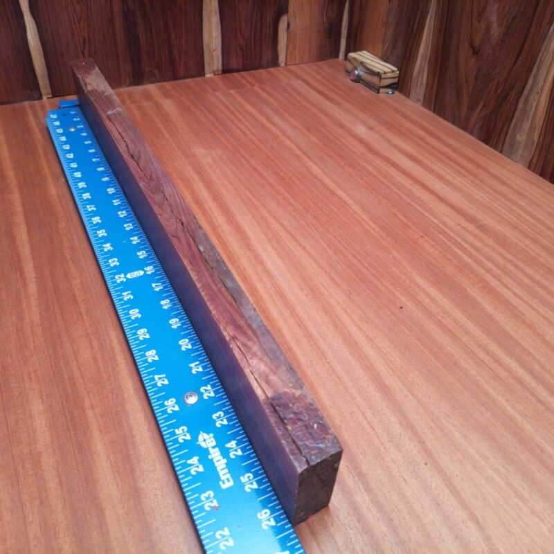 Honduran Rosewood 1.1" X 2.7" X 26.4" Wood Blank for Woodworking Projects - HRDL001185 7 Craft something luxurious with your Honduran Rosewood! From elegant coffee table legs to unique jewelry boxes, this versatile piece allows you to create high-end drawer pulls and charming picture frames with flair. If you ever wanted a knife handle that doubles as a conversation starter, you'll love this wood's charm! Get ready to unleash your inner artisan and turn your home into a gallery! This piece of Honduran Rosewood measures 1.1 inches by 2.7 inches by 26.4 inches, offering a high-quality option for a variety of woodworking projects.