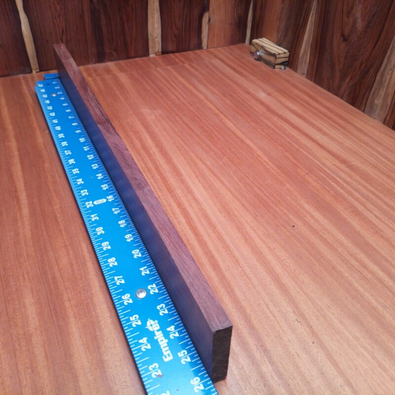 Honduran Rosewood 0.7" X 2.7" X 25.9" Wood Blank for Woodworking Projects - HRDL001186 7 With Honduran Rosewood, you can turn the mundane into the magnificent! Imagine crafting luxury guitar backs, unique picture frames, or even stunning wood sculptures that will make your friends swoon! Dive into artisanal treasures with stylish serving trays and custom drawer pulls that scream sophistication while secretly being practical. Who knew such a piece could create so much magic in your home? This piece of Honduran Rosewood measures 0.7 inches by 2.7 inches by 25.9 inches, offering a high-quality option for a variety of woodworking projects.