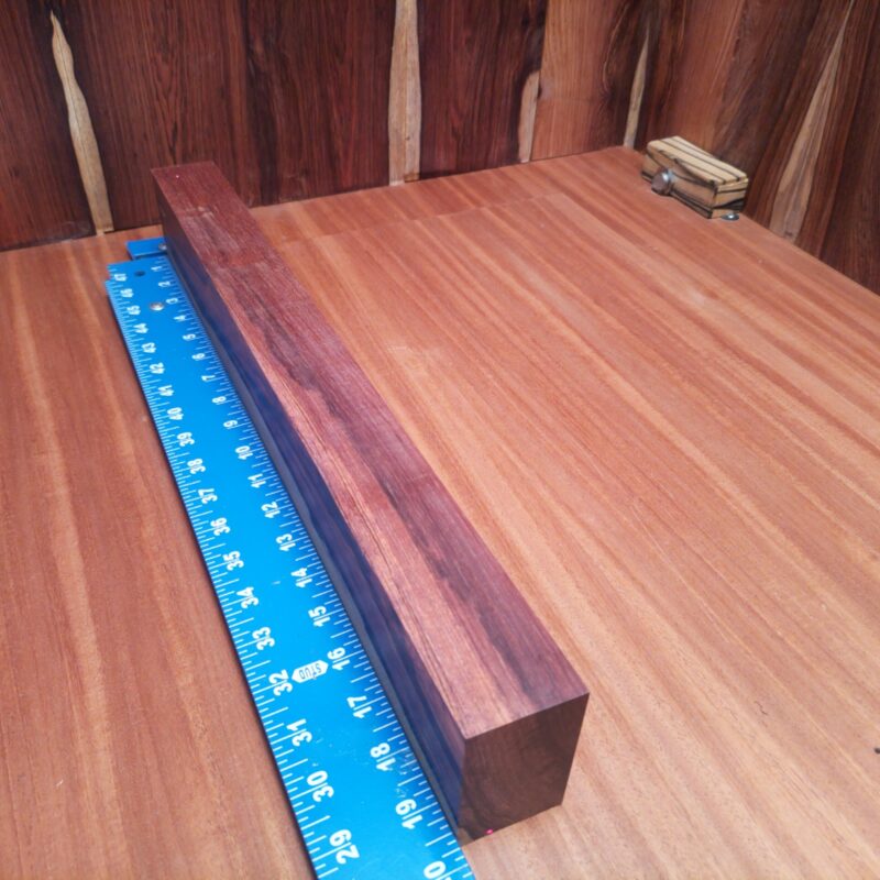 Honduran Rosewood brings class to your home! Create luxury drawer pulls, a custom guitar neck, or a unique serving platter that will have your guests asking for more. The beautiful grains can shape artistic photo frames and whimsical coasters, making everything feel high-end, even that spoon rest! With such versatile dimensions, furniture and decor options are plentiful, making this wood feel like a celebrity among its peers! This piece of Honduran Rosewood measures 1.7 inches by 2.8 inches by 19.6 inches, offering a high-quality option for a variety of woodworking projects.