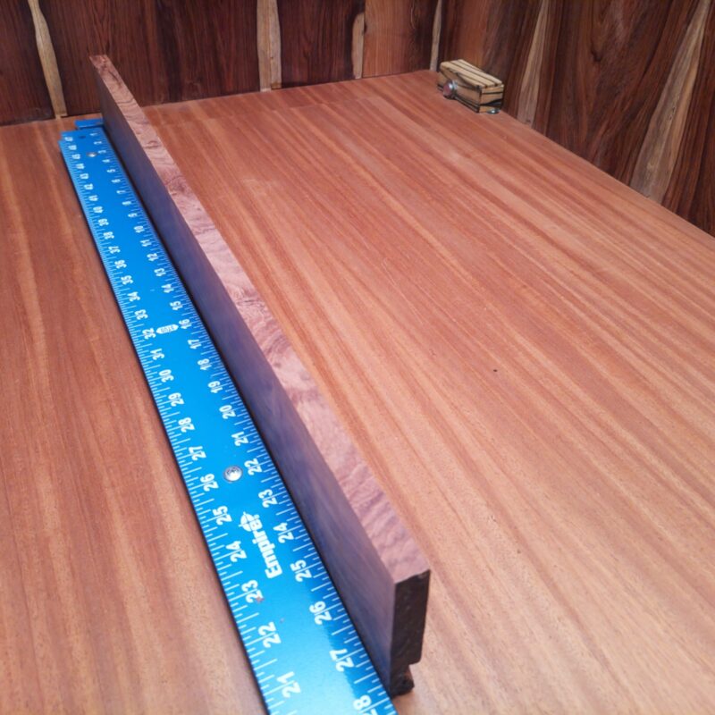 Honduran Rosewood 0.7" X 3.2" X 27.6" Wood Blank for Woodworking Projects - HRDL001188 7 Discover the endless possibilities of Honduran Rosewood! Transform those splinters into high-end drawer pulls, ornate picture frames, or a luxurious charcuterie board that even your cheese can appreciate. Picture elegant bookends, rustic candle holders, and a unique set of custom guitar necks—perfect for all musicians with a flair for style! This piece of Honduran Rosewood measures 0.7 inches by 3.2 inches by 27.6 inches, offering a high-quality option for a variety of woodworking projects.