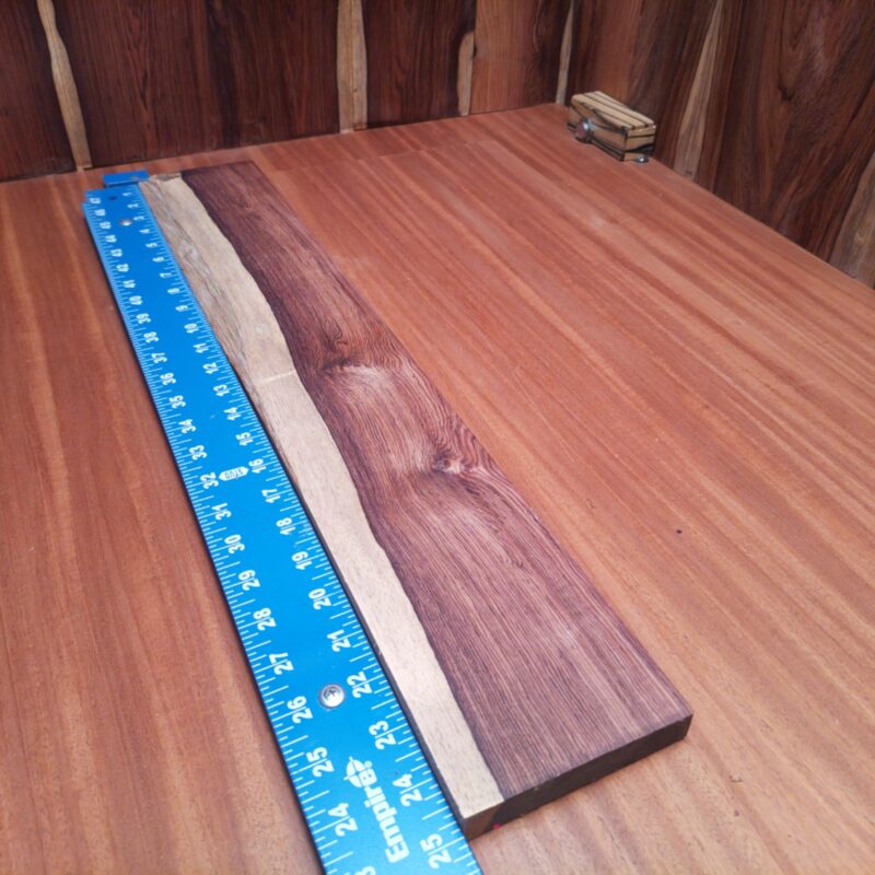 Honduran Rosewood 0.4" X 4.1" X 24.9" Wood Blank for Woodworking Projects - HRDL001189 6 Get creative with Honduran Rosewood G2! Use it for custom knife handles, elegant serving trays, or charming decorative frames. The possibilities are endless; you could even craft high-end acoustic guitar parts for that musical touch. So, whether you're making unique wall art or stylish coasters, you’re bound to impress while keeping things classically wooden! This piece of Honduran Rosewood measures 0.4 inches by 4.1 inches by 24.9 inches, offering a high-quality option for a variety of woodworking projects.
