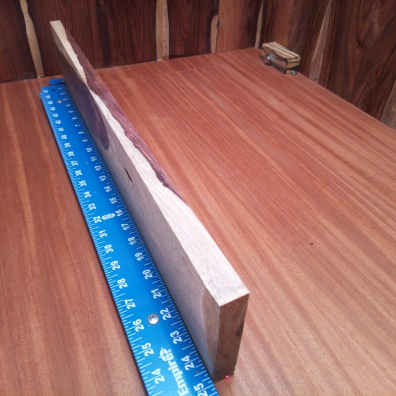 Honduran Rosewood 0.6" X 4.7" X 24.7" Wood Blank for Woodworking Projects - HRDL001195 5 Transform that Honduran Rosewood into a show-stopping guitar body inlay or high-end coasters for your next gathering. Why not whip up some stylish serving trays or elegant bookends while you're at it? This wood is so versatile, it could even make your dreams of custom drawer pulls a reality. Because let’s be honest, who doesn’t love a good wooden spoon action? This piece of Honduran Rosewood measures 0.6 inches by 4.7 inches by 24.7 inches, offering a high-quality option for a variety of woodworking projects.