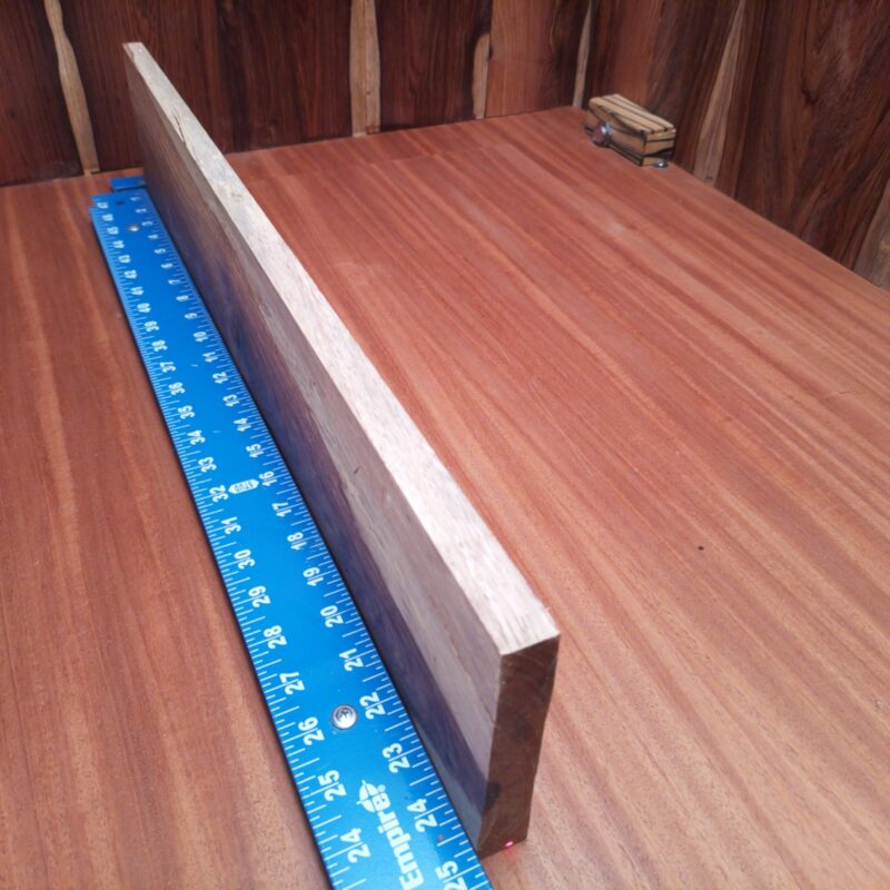 Honduran Rosewood 0.6" X 4.7" X 24.7" Wood Blank for Woodworking Projects - HRDL001195 7 Transform that Honduran Rosewood into a show-stopping guitar body inlay or high-end coasters for your next gathering. Why not whip up some stylish serving trays or elegant bookends while you're at it? This wood is so versatile, it could even make your dreams of custom drawer pulls a reality. Because let’s be honest, who doesn’t love a good wooden spoon action? This piece of Honduran Rosewood measures 0.6 inches by 4.7 inches by 24.7 inches, offering a high-quality option for a variety of woodworking projects.