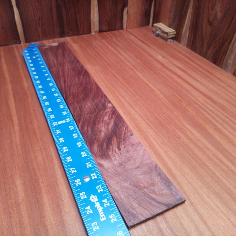 Honduran Rosewood 0.3" X 3.6" X 25.6" Wood Blank for Woodworking Projects - HRDL001196 6 Got some Honduran Rosewood? Transform it into high-end drawer pulls or a luxurious chopping board, and don't stop! Consider inlays for your guitar or even a unique keychain! You can also craft elegant coasters that make you the envy of dinner parties! Who knew wood could glam up your life this much? This piece of Honduran Rosewood measures 0.3 inches by 3.6 inches by 25.6 inches, offering a high-quality option for a variety of woodworking projects.