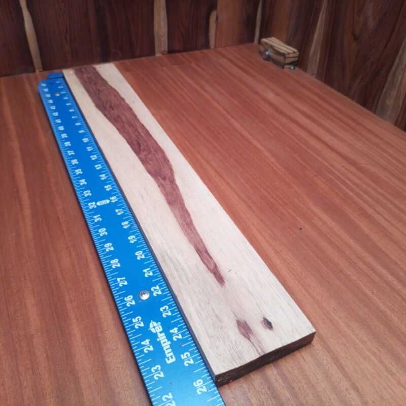 Honduran Rosewood 0.7" X 3.9" X 26.2" Wood Blank for Woodworking Projects - HRDL001197 6 If you're looking for versatility, you've hit the jackpot! From a custom guitar neck to a luxurious cutting board, this piece of wood can transform into almost anything. Imagine elegant coasters, a hand-carved walking stick, or a decorative candle holder gracing your space—now that's creativity! Talk about a wood that can do it all, right? This piece of Honduran Rosewood measures 0.7 inches by 3.9 inches by 26.2 inches, offering a high-quality option for a variety of woodworking projects.