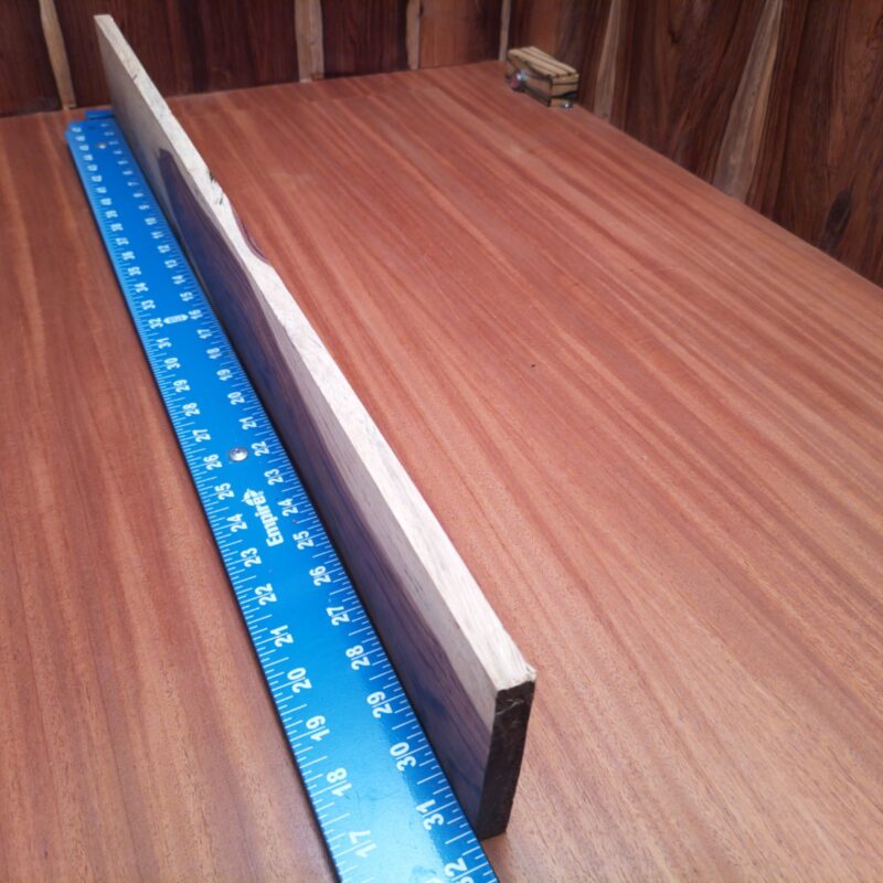 Looking to elevate your decor? Transform Honduran Rosewood into a custom guitar neck or a luxury serving tray! Whether you’re crafting sleek picture frames or elegant napkin holders, the only limit is your imagination—and your woodshop! Each piece is just waiting to become that high-end decorative touch you never knew you needed! This piece of Honduran Rosewood measures 0.5 inches by 3.8 inches by 31.6 inches, offering a high-quality option for a variety of woodworking projects.