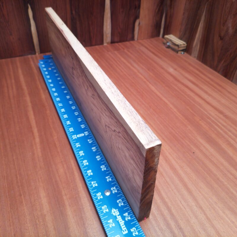 Imagine a world where you can have a custom guitar body and a luxury drawer front—made from the exact same piece of wood. Honduran Rosewood is like the Swiss Army knife of materials, bringing elegance to picture frames, artistic sculptures, and even stylish office desk organizers, all made possible by its glorious dimensions! This piece of Honduran Rosewood measures 0.8 inches by 6.5 inches by 24.3 inches, offering a high-quality option for a variety of woodworking projects.