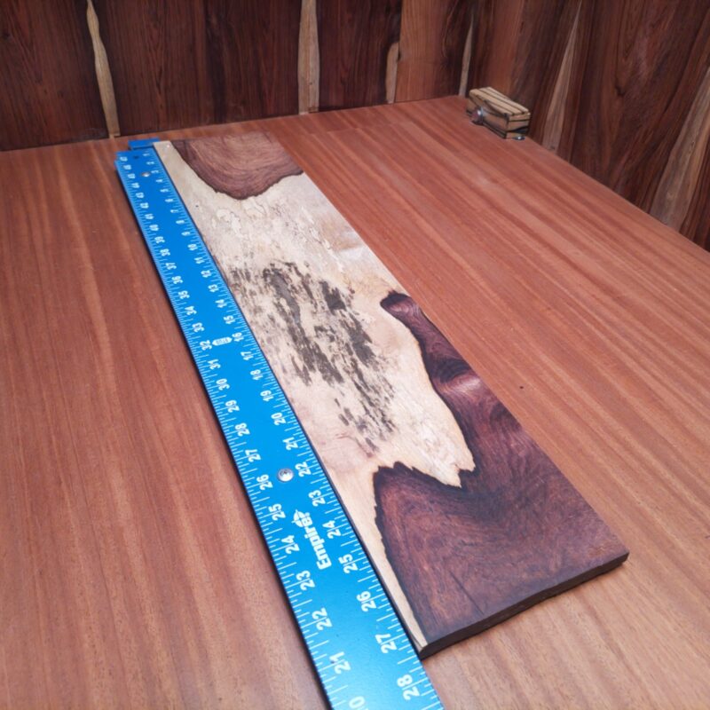 With Honduran Rosewood, you can create high-end items like a guitar fretboard or an exquisite jewelry box lid. Impress guests with decorative wall art or elegant serving trays. Whether it’s rustic bookends or unique napkin holders, this beautifully grained wood offers endless possibilities for your stylish projects. Keep your craft skills feeling sharp and handy! This piece of Honduran Rosewood measures 0.5 inches by 5.7 inches by 27.2 inches, offering a high-quality option for a variety of woodworking projects.