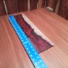 Mexican Cocobolo 0.3" X 5.0" X 20.1" Wood Blank for Woodworking Projects - MCDL001166 9 With a piece of this stunning wood, you're not just crafting a cutting board or a fancy picture frame; you're creating art! Picture this: a jewelry box that even a dragon would envy, a phone dock so extravagant it could host a party, or a lamp shade bright enough to light up a Broadway show! The possibilities are endless—dare to imagine more? This piece of Mexican Cocobolo measures 0.3 inches by 5.0 inches by 20.1 inches, offering a high-quality option for a variety of woodworking projects.